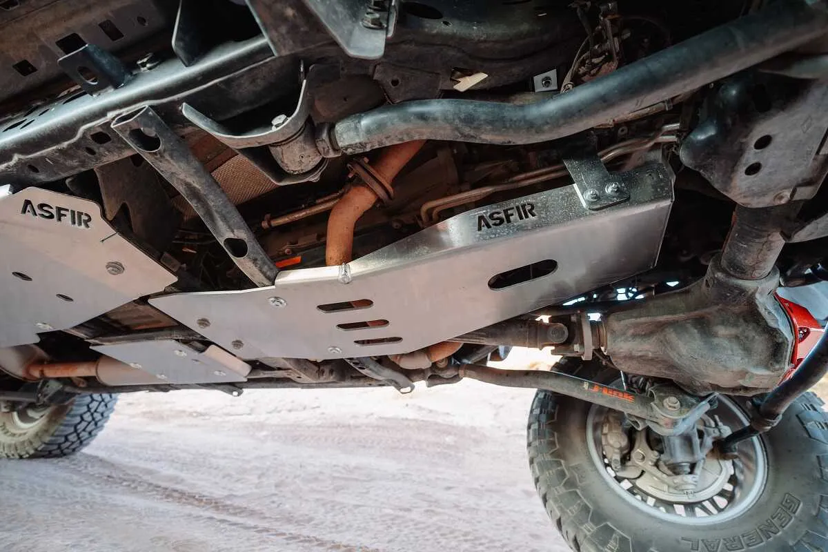 ASFIR aluminum skid plates under a Subaru on the trail